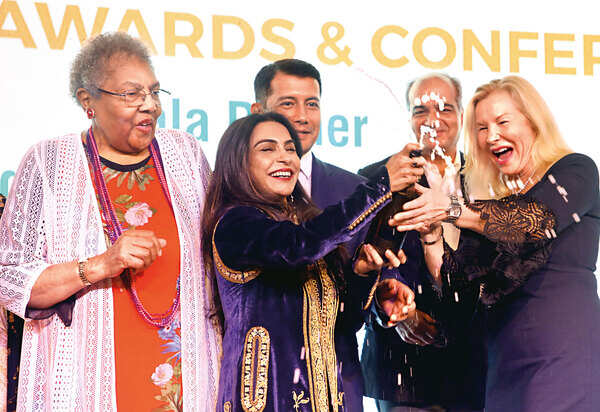 Ruth A Davis, Chairperson, IWEC Foundation, Harjinder Kaur Talwar, FLO, President and Global Ambassador of IWEC Foundation, Uzbek Ambassador Farhod Arziev, Bhartindu Talwar and Carmen Castillo, Vice Chairperson, IWEC Foundation, raise a toast to successful women entrepreneurs