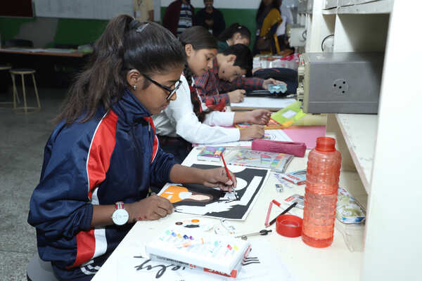 Students painting during Painting Competition at three-day Vikram Sarabhai Centenary Programme