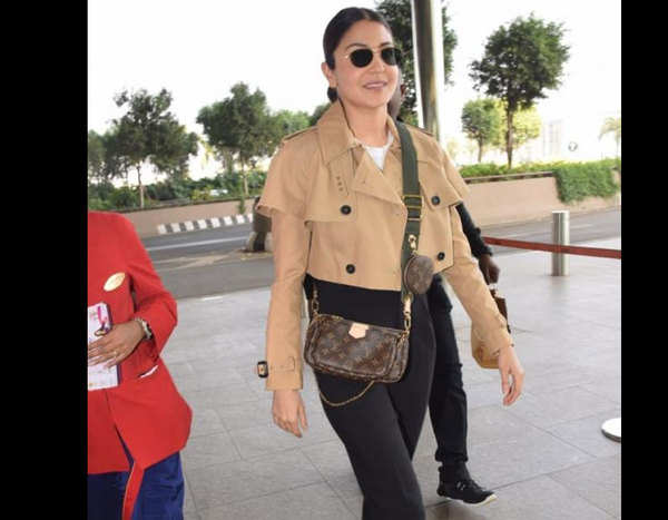 Anushka Sharma completes her Airport look with Christian Dior Bag