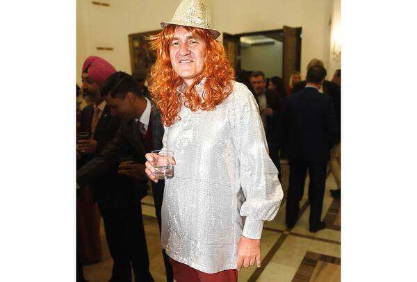 László Pallos, Defence Attache, Hungarian embassy, dressed as a band member from ABBA