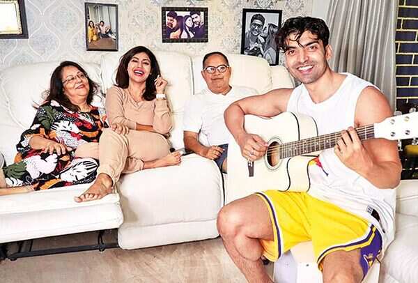 DEBINA BONNERJEE WITH PARENTS AND HUSBAND, GURMEET (PLAYING GUITAR)
