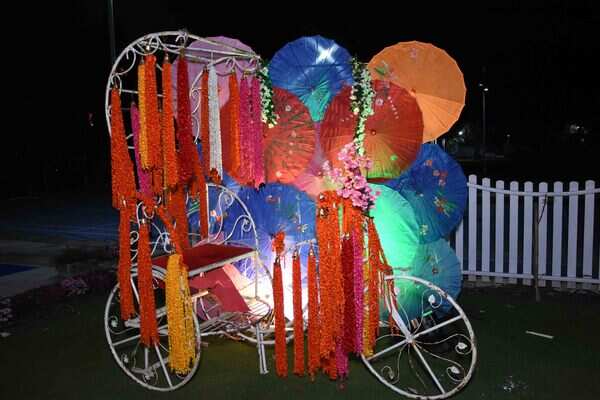 Decked up rickshaw that was decorated with fresh flowers and umbrellas