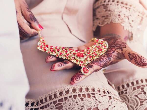 try different colours of jewellery and stones