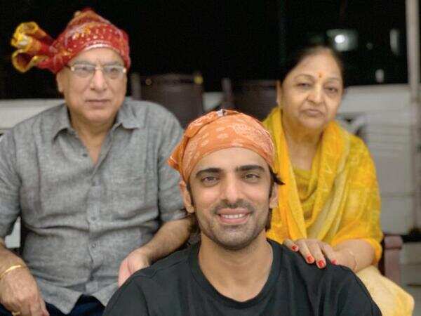 A file shot of Mohit Mallik with his parents