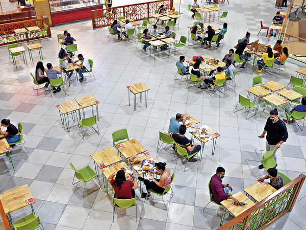Food courts at malls are following social distancing norms as well, with tables and chairs laid out at a safe distance from each other