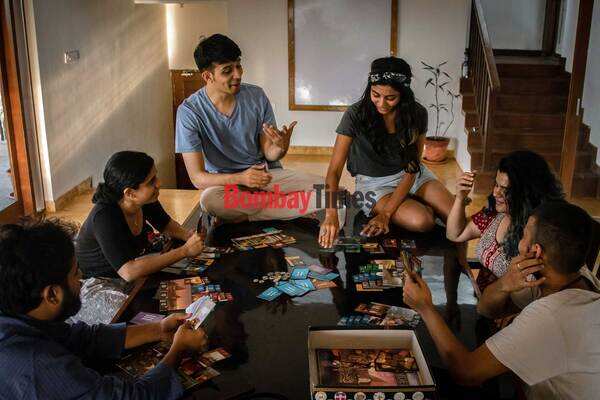 Anand Gandhi's team playing board games in office