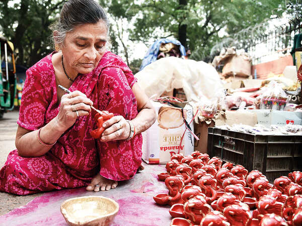 Savita Devi has been selling decorated diyas over four decades now at the market