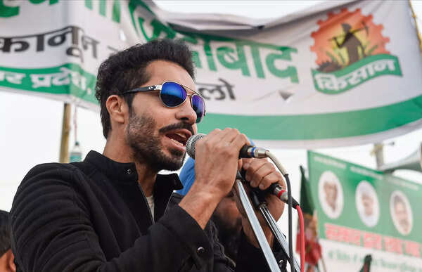 Ghaziabad: Indian actor Deep Sidhu addresses farmers at Ghazipur during their 'D...