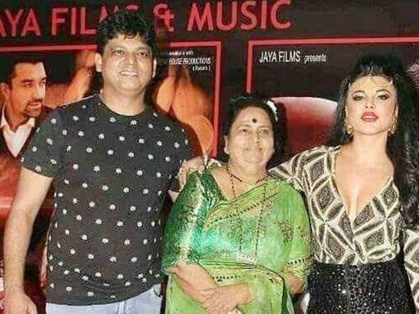Rakhi Sawant and (left) with brother Rakesh and mother Jaya