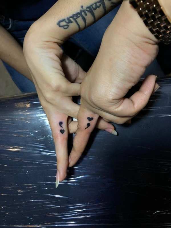 tiny tattoos — tattoofilter: Matching pineapple tattoos on the...