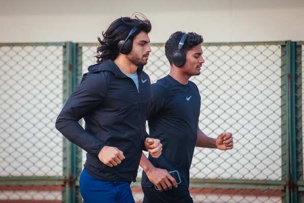 Neeraj jogging with another athlete - Copy