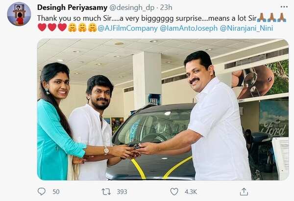 Anto Joseph handing over the car to Desingh and Niranjani