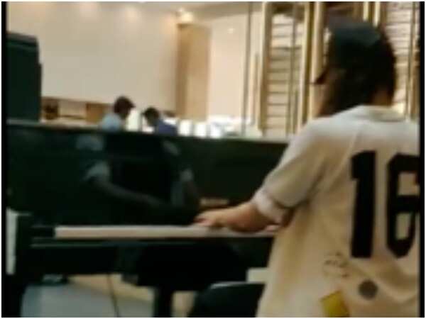 Adah Sharma playing the piano