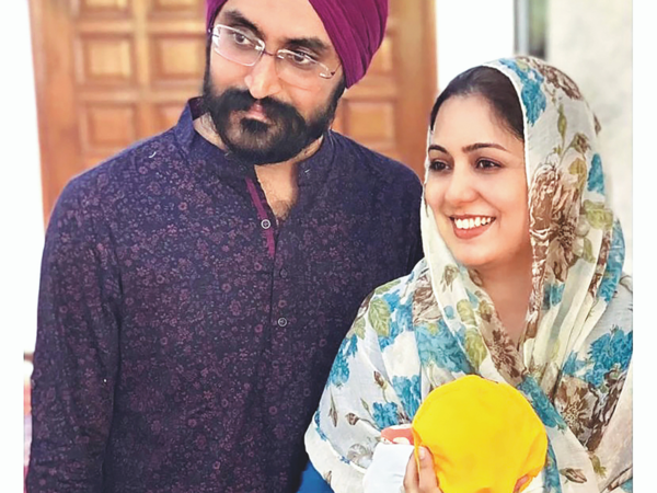 Harshdeep Kaur with Mankeet Singh and a newborn Hunar