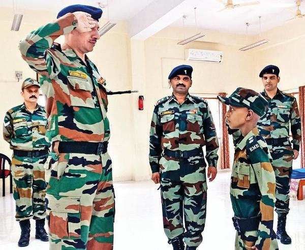 Wishes fulfilled: Boy dons army fatigues, 5-year-old gets doll set