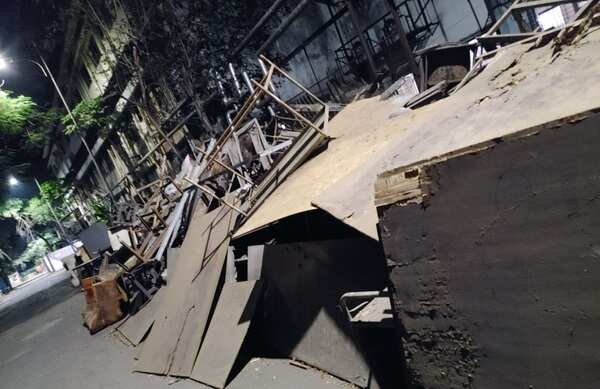Benches, tables and chairs lying on the hostel premises.