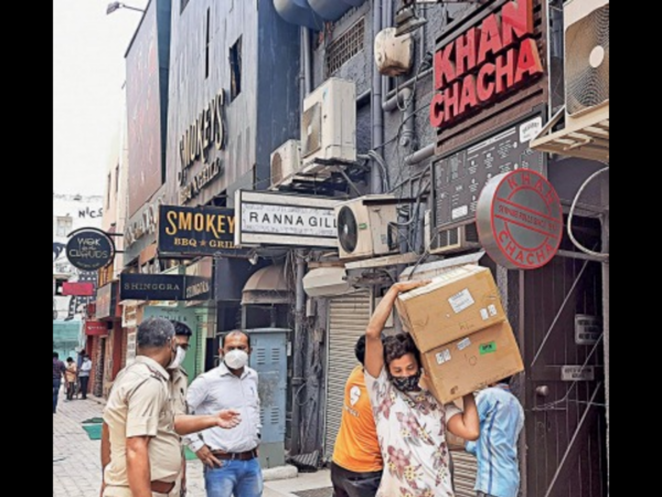 Police seizing O2 concentrators during a raid at Khan Chacha. (PTI photo)