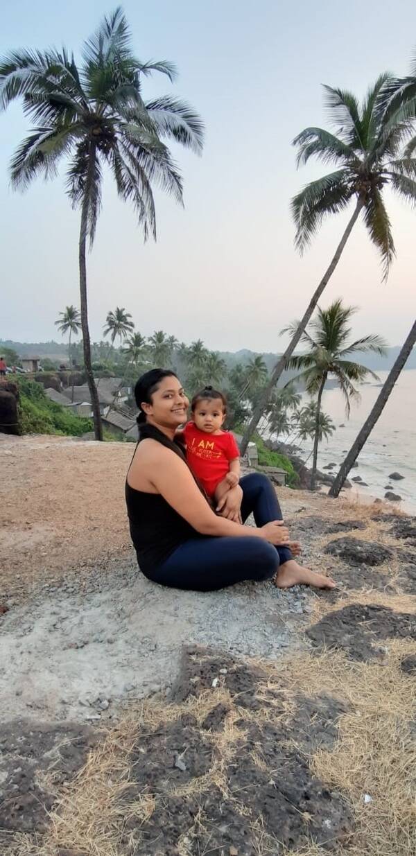 Samita and her kid at the beach