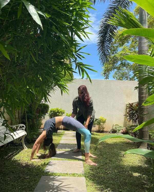 Rhea Chakraborty talks about ‘healing’ as she attempts a tough yoga ...