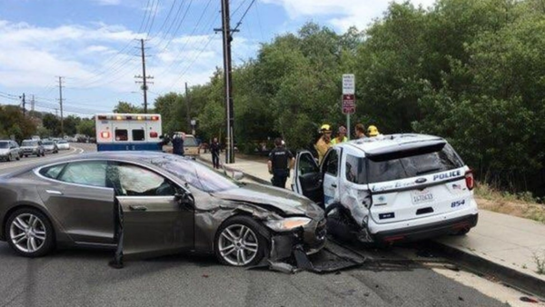 Tesla crashed into a police car