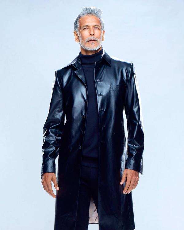 Milind Soman looks irresistibly hot in faux leather trench - Times of India