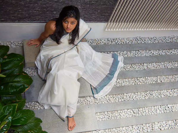 Kerala handwoven cotton plain saree in off white color with golden zari  border