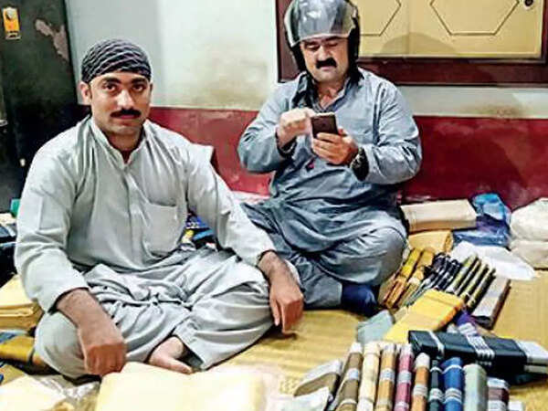 City-based Afghans at Shyampada Dutta’s shop near Nakhoda Masjid to buy turbans