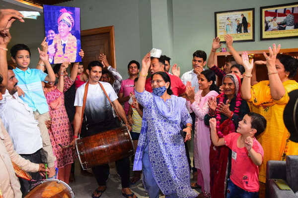 Jaipur: Family members celebrate javelin thrower Devendra Jhajharia's silver med...