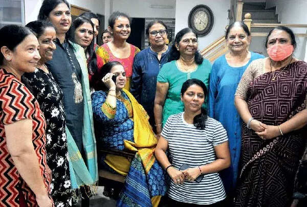 His wife (on phone) with family members and friends on Sunday