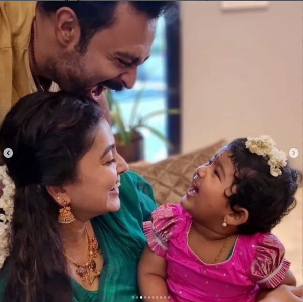 Sneha and Prasanna with their daughter