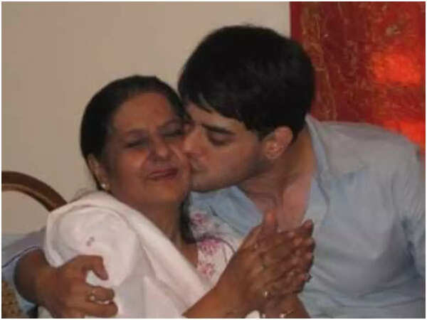 Hasan with his mother