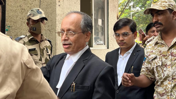Public prosecutor Pradeep Gharat leaving the Bandra court pl add to story