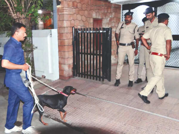 Cops investigate at the bungalow of businessman Pravin Patel