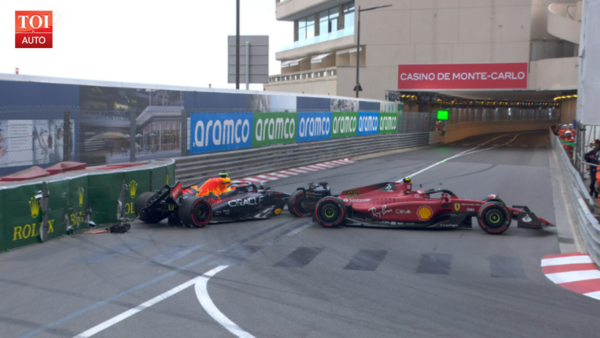 Checo Perez barges into the barriers, and Sainz hits him from behind.