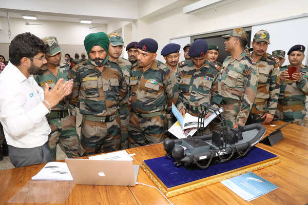 Maj. Gen. Mohit Wadhwa, GOC, Golden Katar Division visiting defence startups from across country at Defence Demo Day at Karnavati University