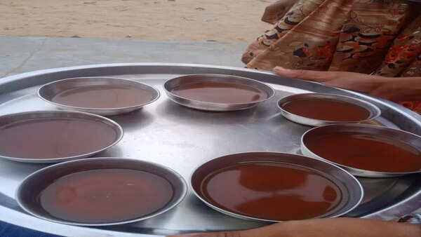 Locals in a village in Jodhpur drinking black tea.