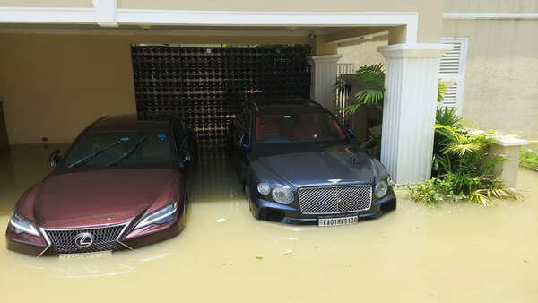 ​ High-end cars submerged in water-logged DivyaSree 77°​