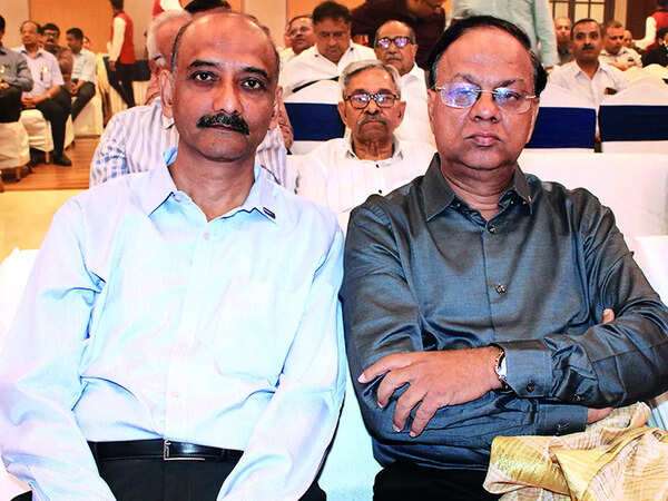 Ajay Khare (L) and Uttam