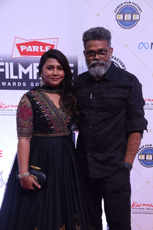Pushpa Movie Director Sukumar with wife Thabitha the red carpet at the 67th Parle Filmfare Awards South 2022
