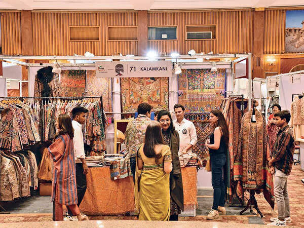 Visitors browsing through the handloom collections at display