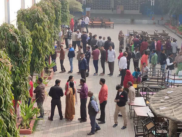 Long queues of voters outside a polling stations