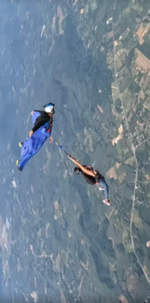 Youngest skydiver from Sangam City completes wingsuit swing skydive