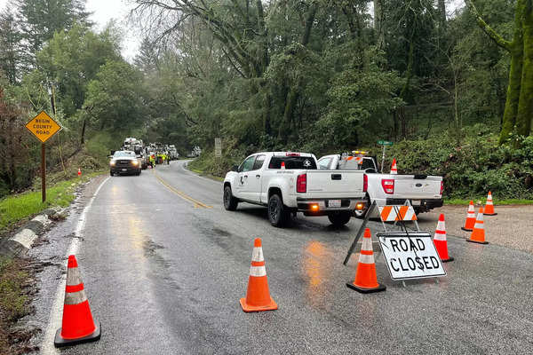 California deluge forces mass evacuations, boy swept away