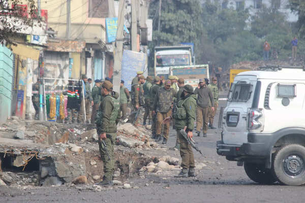 Police cordon-off the twin blast site in Narwal.