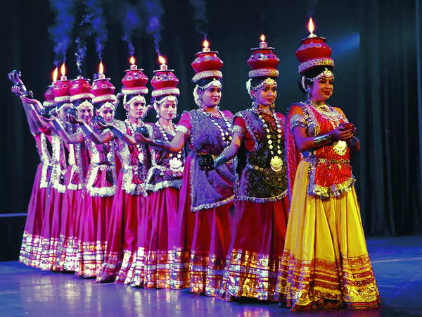 Deepshika and group performing at the event