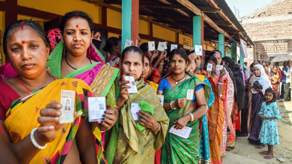 Female voters showing ID cards in North Tripura district