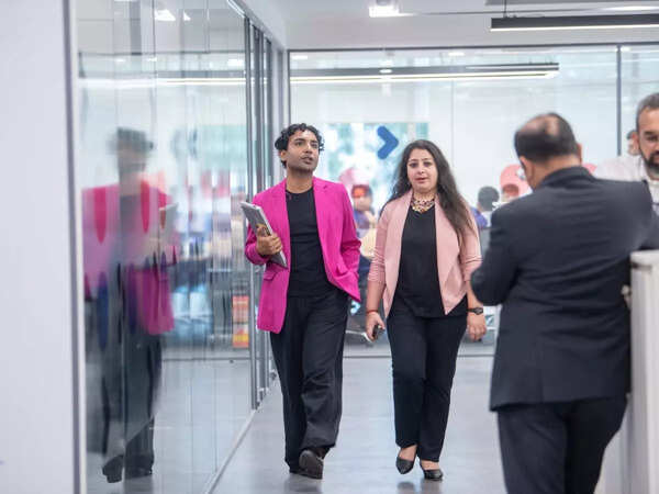 Rovin with his co-worker at Randstad India