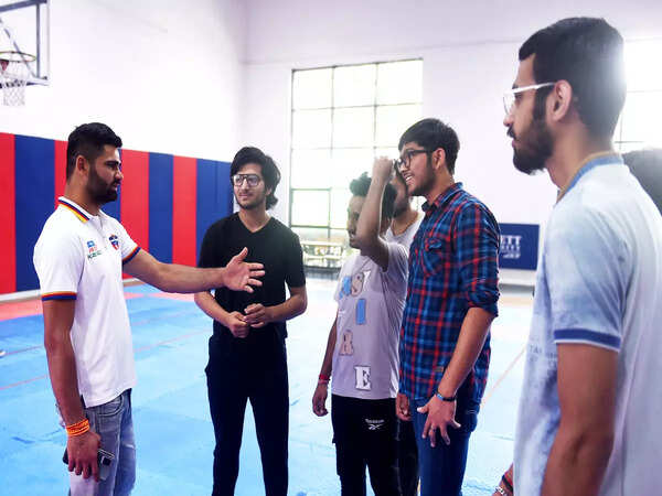 Pradeep Narwal interacting with students at the sports complex