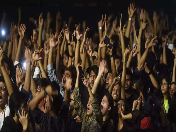 an enthusiastic crowd gathered at the concert