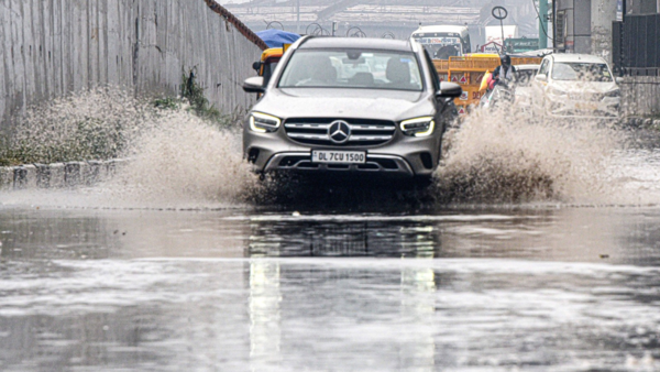 Waterlogged road at Gandhi Nagar. (TOI photo by Rajesh Mehta)